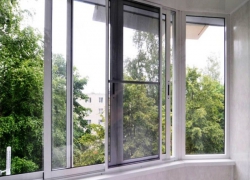 Алюминиевые раздвижные окна на балкон